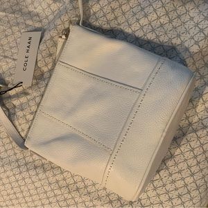 NWT Cole Haan mini bucket white cross body. Never used.